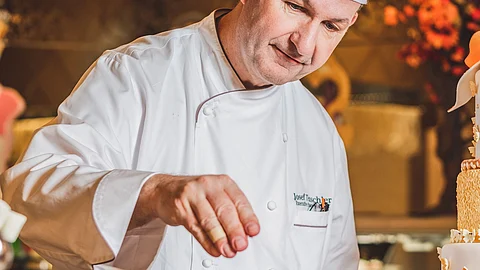 Chef Josef Teuschler, director of culinary of Okada Manila, gives a finishing touch to a delightful side dish.