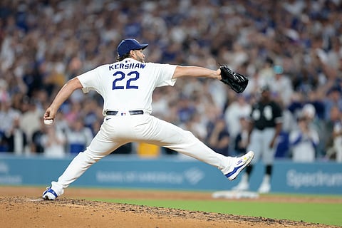 CLAYTON Kershaw of the Los Angeles Dodgers strikes out Vinny Capra of the Chicago White Sox during the sixth inning to record his 3,000th career strikeout at the Dodger Stadium.