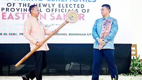 OUTGOING Eastern Samar Governor Ben Evardone turns over the provincial seal to his son and successor, Ralph Vincent Evardone, during inauguration rites in Borongan City.
