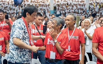 Negros farmers get land, debt relief