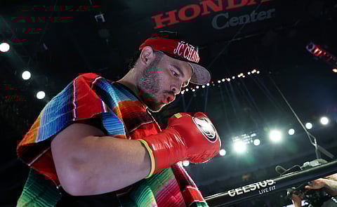MEXICO'S Julio Cesar Chavez Jr. enters the ring ahead of his cruiserweight boxing bout against USA's Jake Paul at the Honda Center in Anaheim, California, on June 28, 2025. Mexican boxer Julio Cesar Chavez Jr. has been arrested by US immigration officers and is being processed for deportation from the United States, the Department of Homeland Security said on July 3, 2025. Chavez, a former world champion and the son of legendary Mexican fighter Julio Cesar Chavez, was detained by Immigration and Customs Enforcement (ICE) officers in Los Angeles on July 2 after authorities determined that he was in the country illegally, Homeland Security said in a statement.