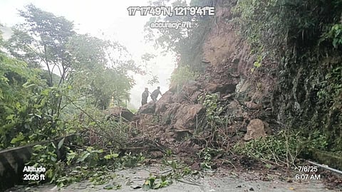 PERSONNEL from the Department of Public Works and Highways-Kalinga are deployed to clear the Calanan-Pinukpuk-Abbut Road near the Kalinga-Mountain Province boundary after heavy rains from the southwest monsoon triggered soil and rock erosion.