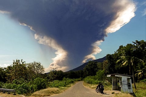 Mount Lewotobi Laki-laki erupts, as seen from Nangahale village in Sikka, East Nusa Tenggara on 7 July 2025.