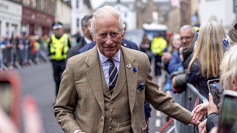 Britain's King Charles III meets members of the public along Main Street in Campbeltown, western Scotland on July 3, 2025, on the third day of their Majesties The King and Queen's visit to Scotland.