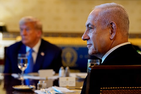 U.S. President Donald Trump (L) and Israeli Prime Minister Benjamin Netanyahu (R) attend a dinner in the Blue Room of the White House on July 07, 2025 in Washington, DC. Trump is hosting Netanyahu for a dinner as the two discuss a potential ceasefire agreement to end the fighting in Gaza