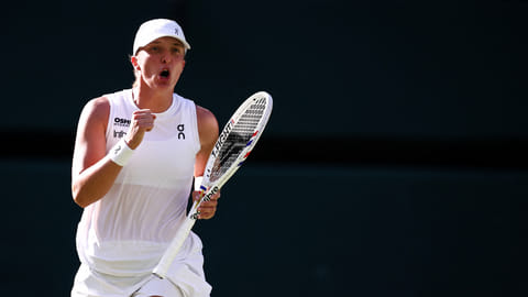 IGA Swiatek celebrates after pulling off a 6-2, 6-0 win over Belinda Bencic in the women’s event semifinals of the Wimbledon Championships.