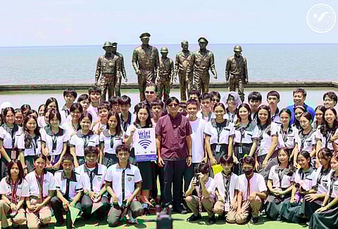 PRESIDENT Ferdinand R. Marcos Jr. joins students in testing the fast and reliable free public WiFi connection during its launch at the MacArthur Landing Memorial National Park. The project, led by the Department of Information and Communications Technology, aims to expand internet access across the country.