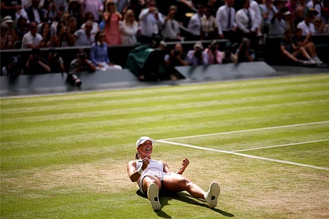 POLAND'S Iga Swiatek celebrates after winning against US player Amanda Anisimova during their women's singles final tennis match on the thirteenth day of the 2025 Wimbledon Championships at The All England Lawn Tennis and Croquet Club in Wimbledon, southwest London, on July 12, 2025.