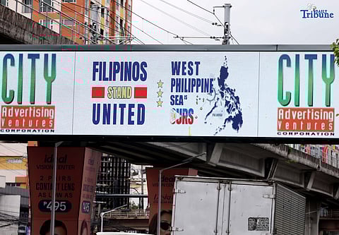 AN electronic billboard along EDSA in Quezon City displays a message on the West Philippine Sea on Saturday, 12 July 2025 marking the ninth anniversary of the 2016 arbitral ruling. A June 26–30 Pulse Asia survey shows 73% of Filipinos believe the Marcos administration should continue asserting the country’s maritime rights in accordance with international law.