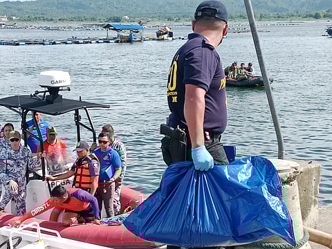 SOCO personnel received the two sacks recovered from the dive site where the missing sabungeros were supposed to be dumped.