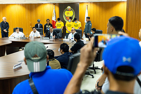 The three suspects in the killing of a Transport Network Vehicle Service driver in Parañaque City are presented by officials from the National Bureau of Investigation on Monday.