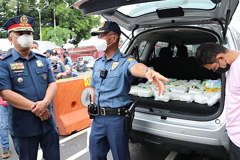 Throwback Police Lt. Gen. Jonnel C. Estomo (left), who has been tagged in the case of the missing sabungeros, is seen in this August 2022 photo with then Quezon City Police District Director PBrig. Gen. Nicolas Torre III following the seizure of 25 kilos of shabu. At the time, Estomo was acting chief of the National Capital Region Police Office. Torre now serves as chief of the Philippine National Police.