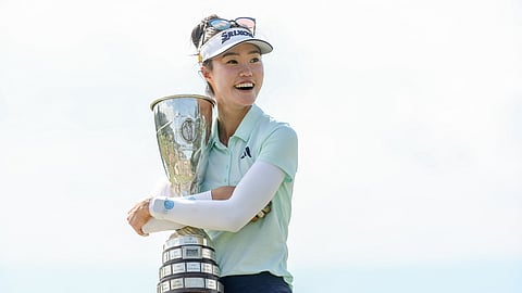 GRACE Kim smiles after beating Jeeno Thitikul in the play-off to complete a sensational finish for the Evian Championship title at the Evian Resort Golf Club in France.
