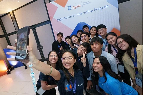 PROGRAM facilitators take a group photo with some interns at their recent onboarding for the Ayala Group Summer Internship Program.