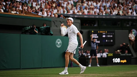 JANNIK Sinner vows to further improve after winning his first Wimbledon title.