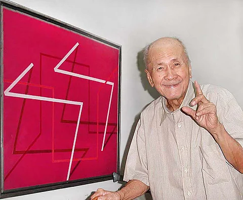 Constancio Bernardo posing with Perpetual Motion, 2002.