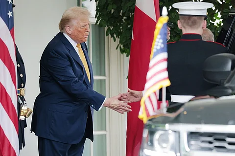 WASHINGTON, DC - JULY 16: U.S. President Donald Trump greets Crown Prince of Bahrain Salman bin Hamad Al Khalifa as he arrives outside the West Wing of the White House on July 16, 2025, in Washington, D.C. Trump is scheduled to hold a bilateral meeting and working lunch with the Crown Prince during the visit.