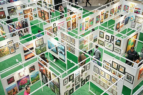 SM City Baguio mall atrium transforms into a walkable art experience, filled with color, culture, and community.