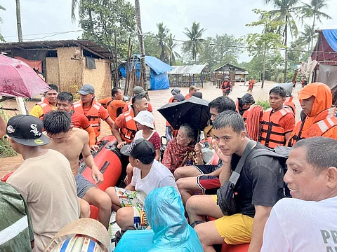 THE Philippine Coast Guard successfully evacuates 88 families from Barangay Sicsican, Puerto Princesa City on Friday, as heavy rains brought by tropical storm ‘Crising’ swamped the area.