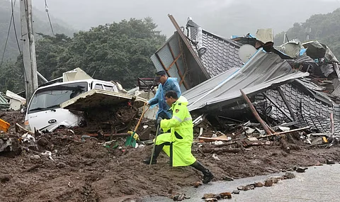A LANDSLIDE triggered by heavy monsoon rains buried homes in Sancheong county, South Korea, killing one and leaving three others missing.