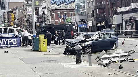 Two dead after speeding car hits cyclist and pedestrian in Manhattan