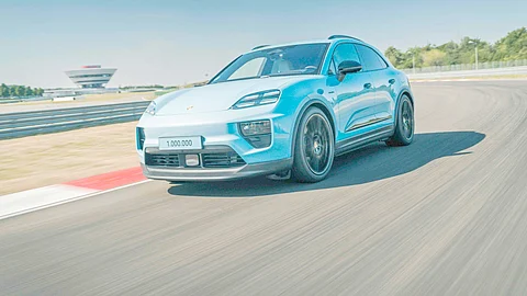 THE one millionth Porsche Macan takes a celebratory lap at the Leipzig factory’s test track.