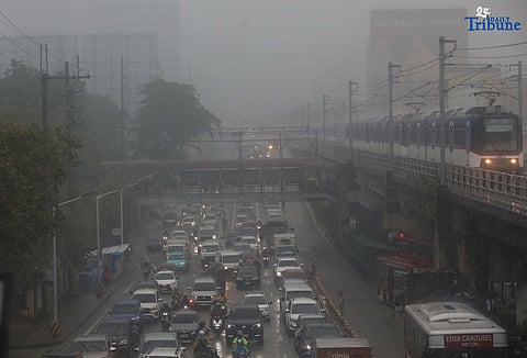 DRENCHED AND BLURRED: Near-zero visibility blankets a street in Quezon City following a heavy downpour on Monday, July 21, 2025. According to PAGASA, a newly formed low-pressure area (LPA) is unlikely to directly impact the country, but has intensified the southwest monsoon (habagat), causing continuous rains over large parts of the Philippines.