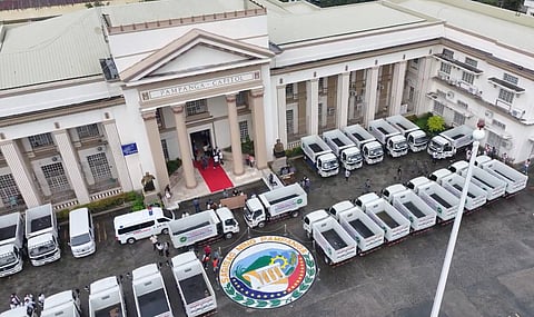 SOME of the 29 mini dump trucks that were distributed to various local governments in Pampanga during a turnover ceremony at the Capitol on Monday.
