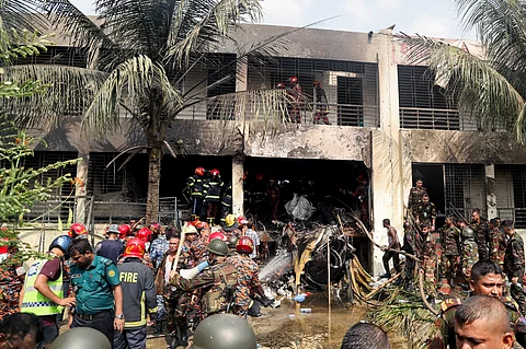 BANGLADESH’s fire service and security personnel conduct a search and rescue operation after an Air Force training jet crashed into school in Dhaka.