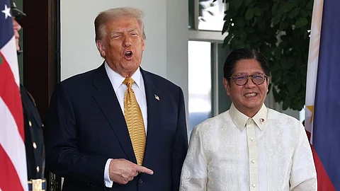 WASHINGTON, DC - JULY 22: U.S. President Donald Trump (L) greets Philippine President Ferdinand Marcos Jr. at the White House on July 22, 2025 in Washington, DC. Trump and Marcos are expected to discuss trade tariffs, increasing security cooperation in the face of China’s growing maritime power in the West Philippine Sea and other topics.