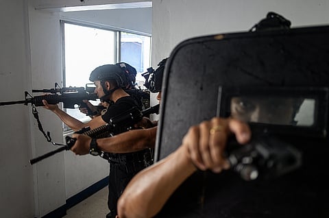 Members of the Manila Police District Special Weapons and Tactics (MPD-SWAT) conducted a simulation exercise for active shooter situations at their headquarters on Wednesday, 23 July 2025, to enhance their response in neutralizing threats.