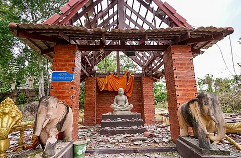 A pagoda damaged by Thai artillery is pictured in Oddar Meanchey province on July 25, 2025. Thailand's acting Prime Minister Phumtham Wechayachai warned on July 25 that cross-border clashes with Cambodia that have uprooted more than 130,000 people "could develop into war", as the countries traded deadly strikes for a second day.