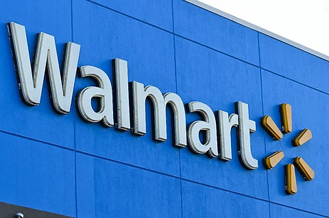 (FILES) The Walmart logo is seen outside a Walmart store in Burbank, California on 15 August 2022. A suspect is in custody after multiple people were stabbed on 26 July 2025 at a Walmart in Traverse City, Michigan, Michigan State Police announced on X (formerly Twitter).