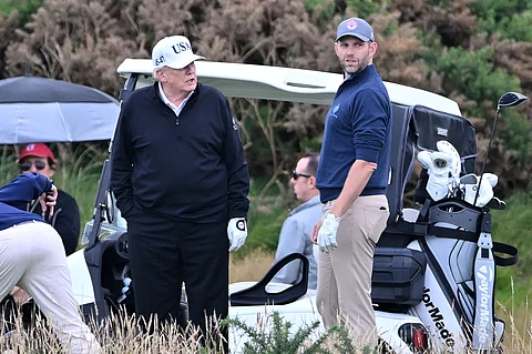 Trump plays golf in Scotland as protesters rally