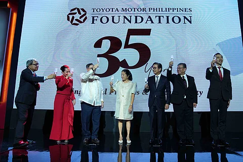 FIRST Lady Liza Araneta-Marcos, together with the Toyota Motor Philippines Foundation officials and partners, raises a toast to 35 years of giving back and moving lives forward.