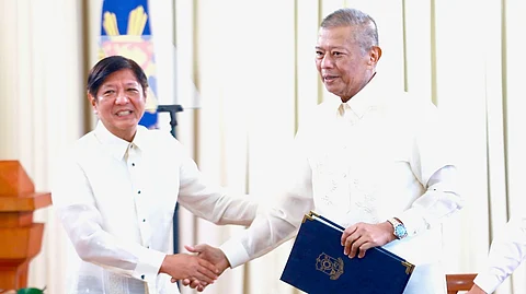 (FILES) President Ferdinand R. Marcos Jr. congratulates SOJ Jesus Crispin ‘Boying’ C. Remulla for finalizing the 2024 DOJ-NPS Rules on Preliminary Investigation and Inquest Proceedings in a move guaranteed to create a lasting and positive impact on the criminal justice system of the Philippines.