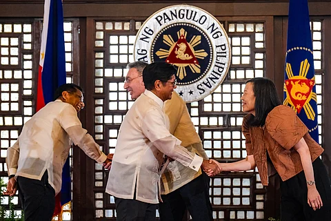 PRESIDENT Ferdinand R. Marcos Jr. receives the Country Partnership Framework documents from World Bank Group Division Director Zafer Mustafaoglu during its ceremonial launch and turnover at Kalayaan Hall, Malacañang Palace on Tuesday.