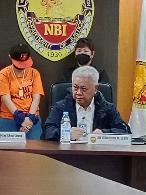 NBI spokesperson Ferdinand Lavin presents the Chinese woman who misrepresent as a Filipina.