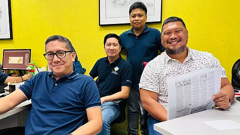 The cohesive and energetic team in the Sports Section (from left) Nick Giongco, Mark Escarlote, Ivan Suing and editor Julius Manicad.