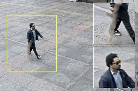 A photo posted by the New York Post shows the g*nman, identified as Shane Tamura, walking through the building with a r*fle in hand.
He k*lled four people, including a police officer, before turning the g*n to himself.