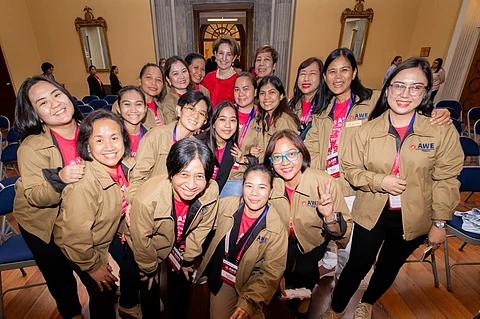 Graduates of the Academy for Women Entrepreneurs join US Ambassador MaryKay Carlson at the 2025 AWE Philippines Summit at the US Embassy in Manila on 29 July.