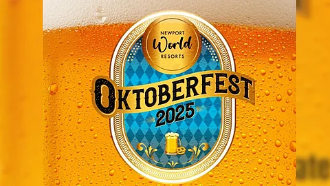 REVELERS raise their steins for a night of beer, music, and Bavarian cheer at Newport's grand Oktoberfest celebration.