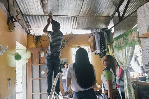 Installation of smoke alarms in fire-prone areas in Barangay Pansol, Quezon City (Photo courtesy of DOST)