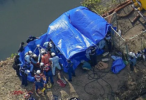 Four workers die after manhole fall
