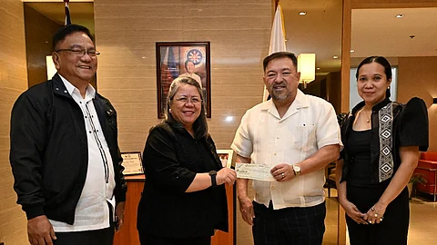 PCSO turns over P57.4-million mandatory contribution to DOE