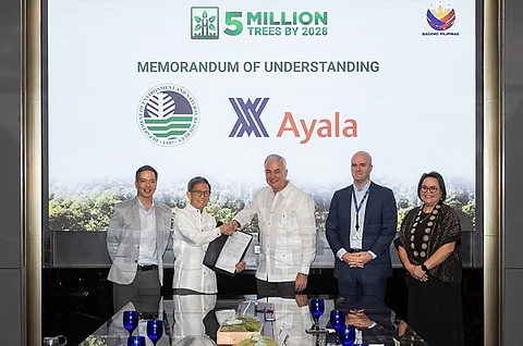 AYALA Group leaders and DENR officials seal their partnership for the Forests for Life program during the ceremonial signing held on 31 July 2025.