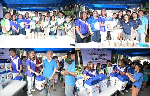 FAMILIES in Barangay 503 receive much-needed aid from PCSO after days of heavy flooding.