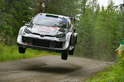 GR Yaris driven by Rovanperä flies through a Rally Finland stage en route to victory.