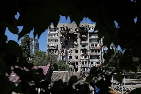 This photograph taken on July 24, 2025 shows a damaged residential building following a drone attack in Odesa, amid the Russian invasion in Ukraine.