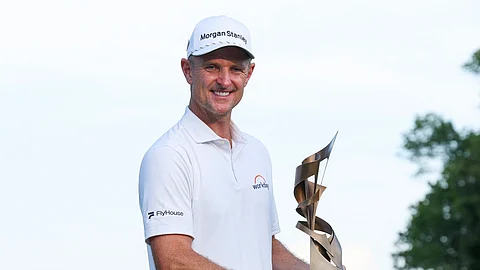 JUSTIN Rose displays his PGA Tour trophy after winning the St. Jude Championship in thrilling fashion.